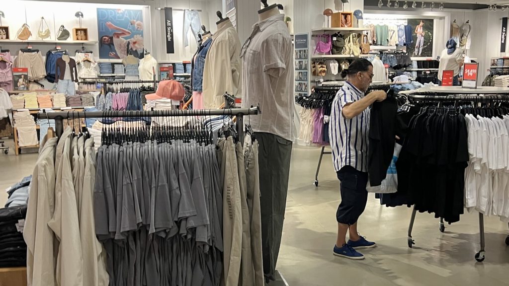 Trade tensions spur consumers to spend less on discretionary purchases
